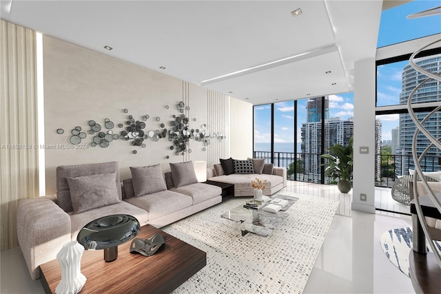 living room featuring floor to ceiling windows and plenty of natural light