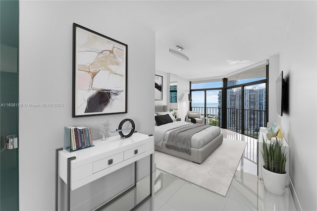 tiled bedroom with a wall of windows and access to outside