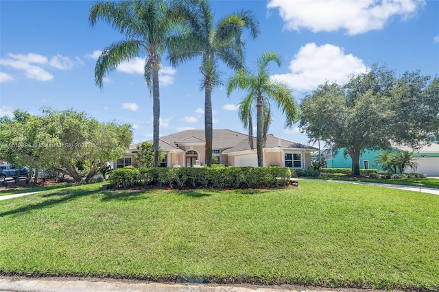 view of front of home with a front lawn