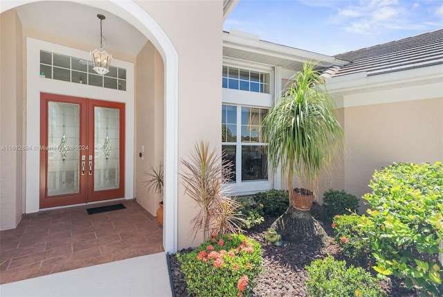 entrance to property featuring french doors