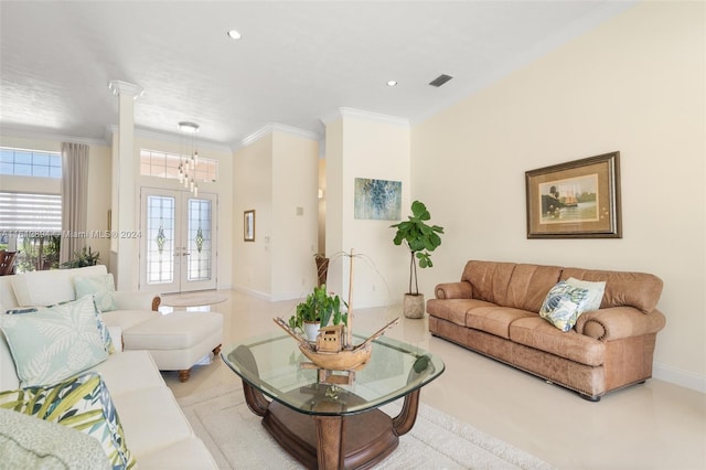 living room with ornamental molding and french doors