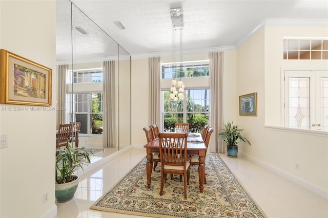 tiled dining room with ornamental molding