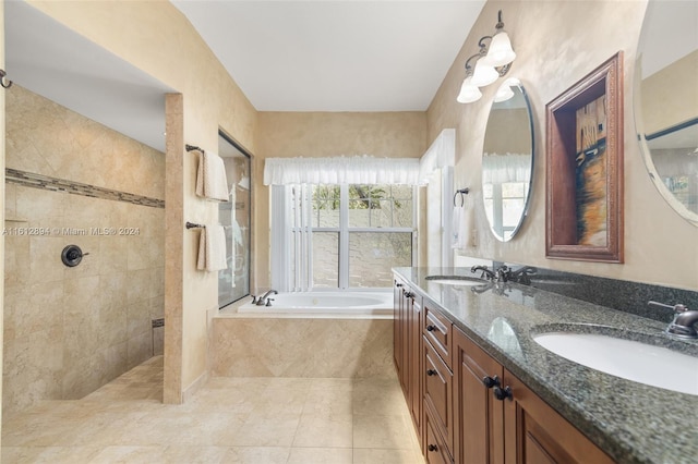 bathroom featuring dual vanity, tile flooring, and shower with separate bathtub