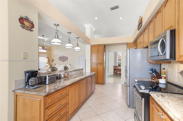 kitchen with appliances with stainless steel finishes, decorative light fixtures, decorative backsplash, light tile patterned floors, and light stone countertops