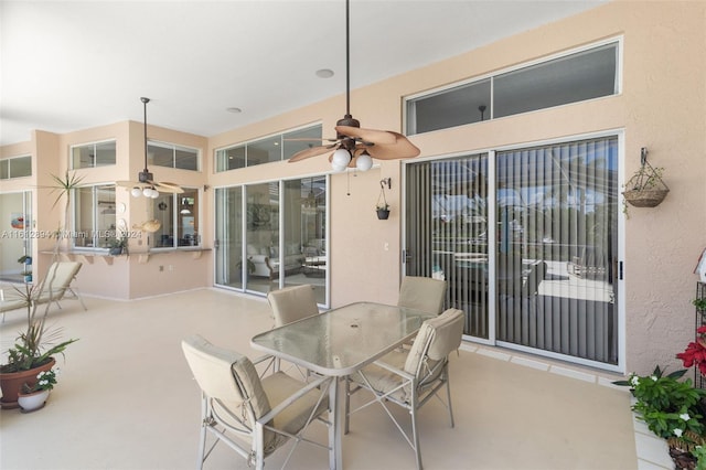 view of patio / terrace featuring ceiling fan