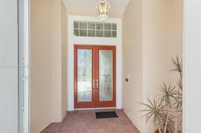 entrance to property featuring french doors