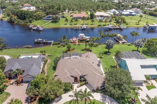 birds eye view of property featuring a water view