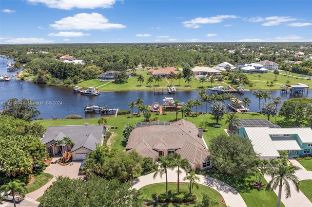 drone / aerial view with a water view