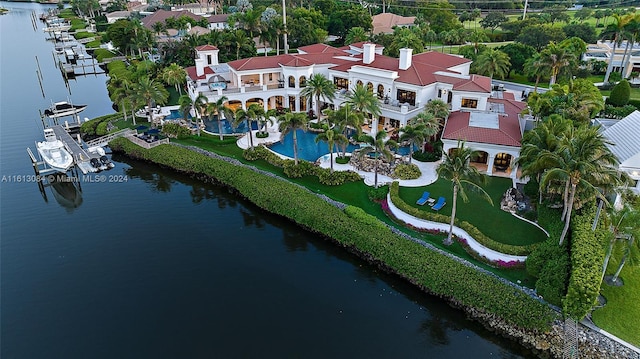 birds eye view of property featuring a water view