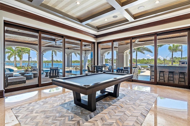 rec room featuring coffered ceiling, a water view, crown molding, billiards, and beam ceiling