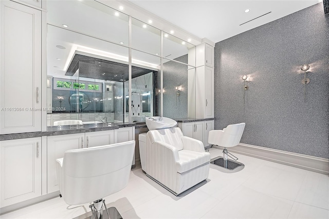 bathroom featuring tile patterned flooring and vanity