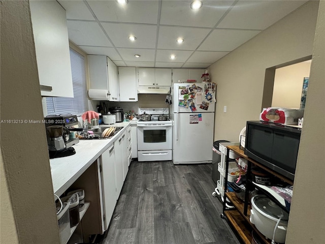 kitchen featuring dark hardwood / wood-style floors, a paneled ceiling, white cabinets, and white appliances