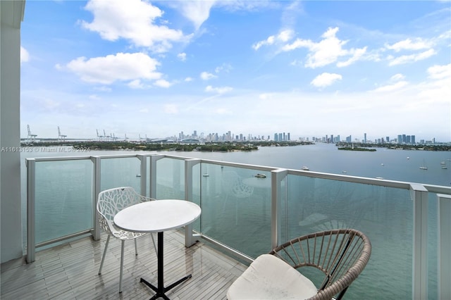 balcony featuring a water view