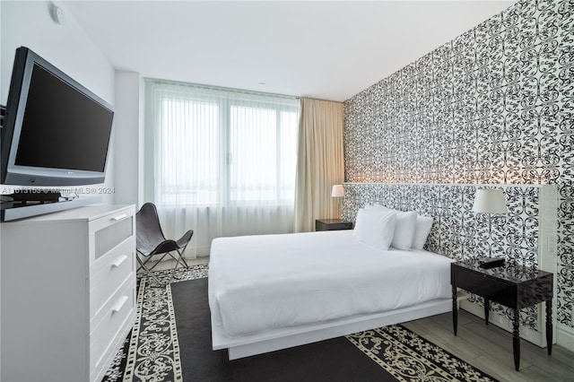 bedroom featuring hardwood / wood-style flooring