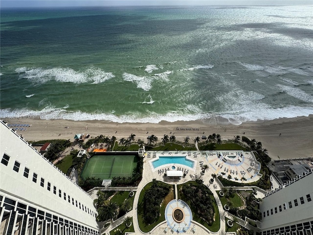 drone / aerial view with a view of the beach and a water view