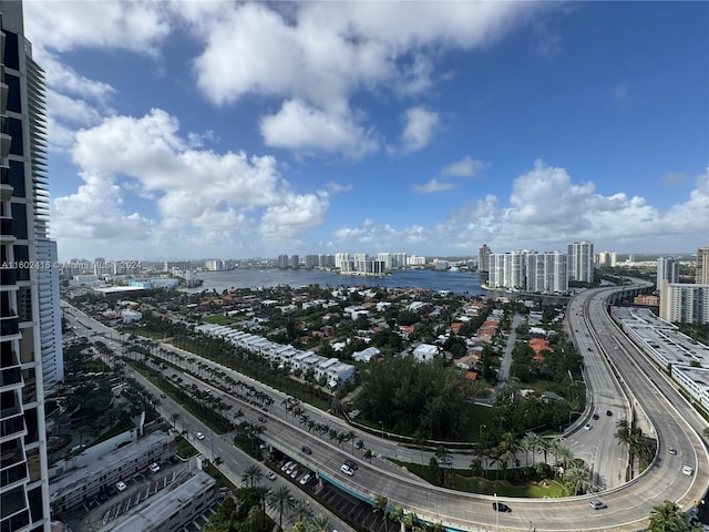 drone / aerial view with a view of city and a water view