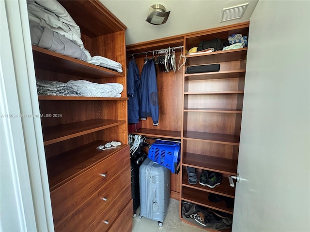 walk in closet featuring visible vents