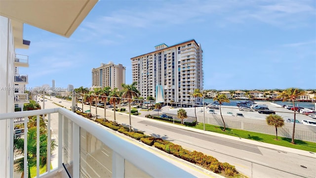 balcony featuring a water view