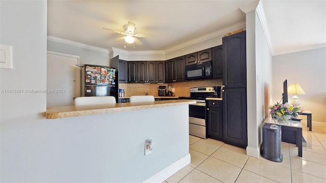 kitchen featuring fridge, stainless steel range with electric stovetop, ceiling fan, dark brown cabinetry, and ornamental molding