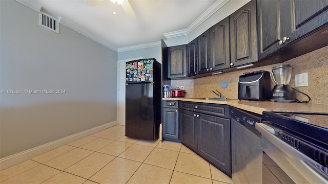 kitchen featuring appliances with stainless steel finishes, ornamental molding, sink, and ceiling fan