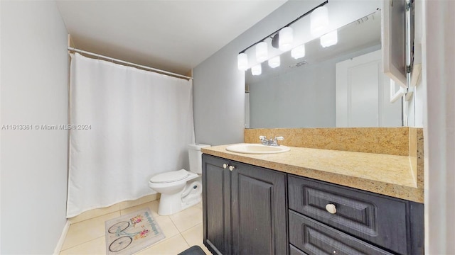 bathroom featuring vanity, toilet, a shower with curtain, and tile patterned flooring