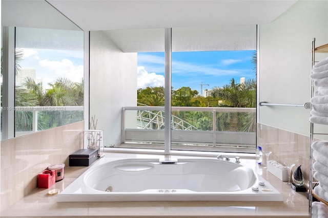 bathroom with tiled tub