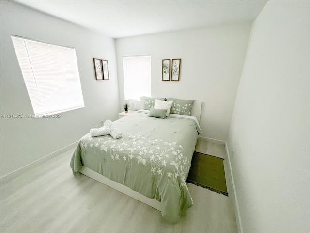 bedroom featuring hardwood / wood-style flooring