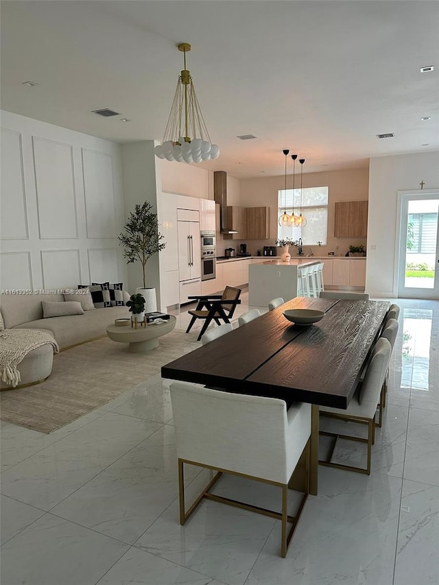 tiled dining space with sink