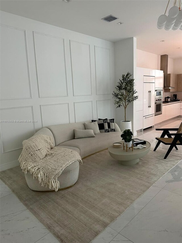 living room with light tile floors