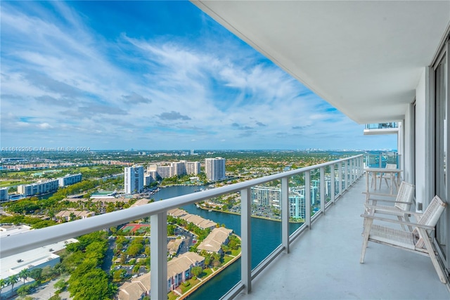 balcony featuring a water view