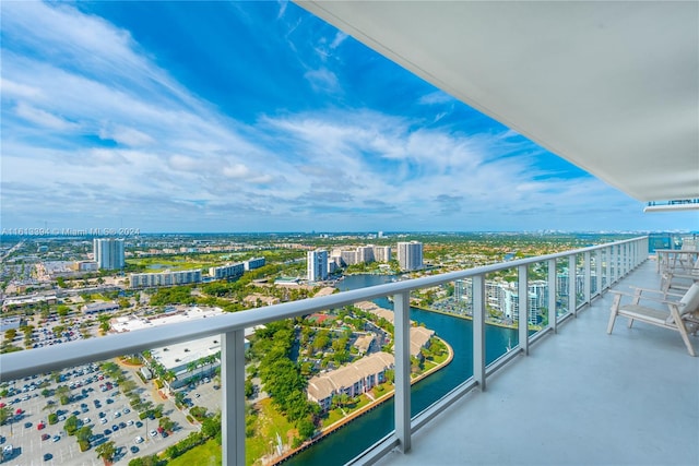 balcony featuring a water view