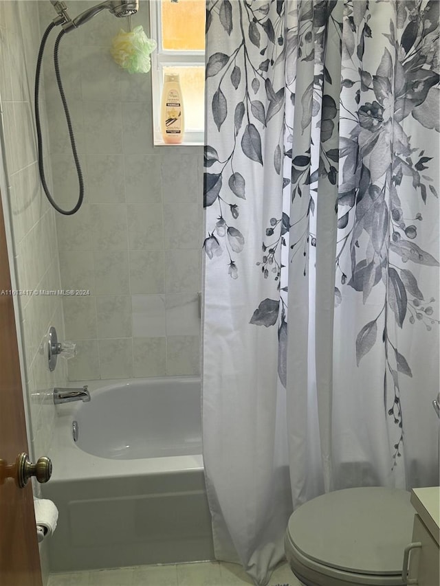 full bathroom with vanity, shower / bathtub combination with curtain, and toilet