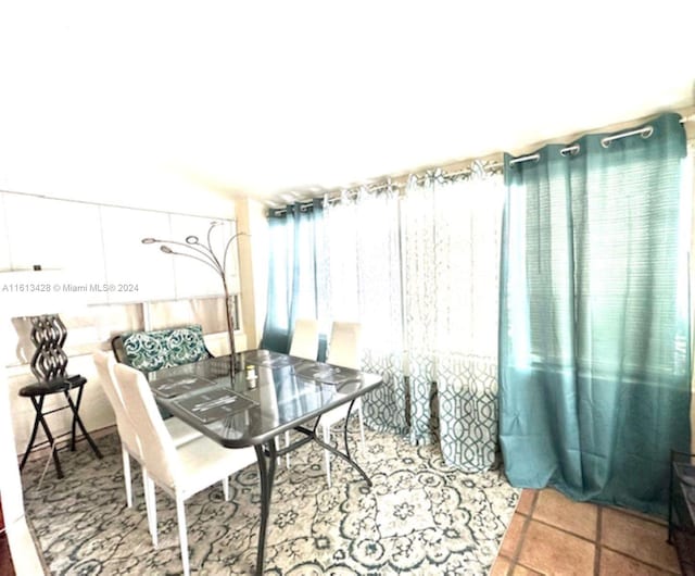 dining room with tile flooring