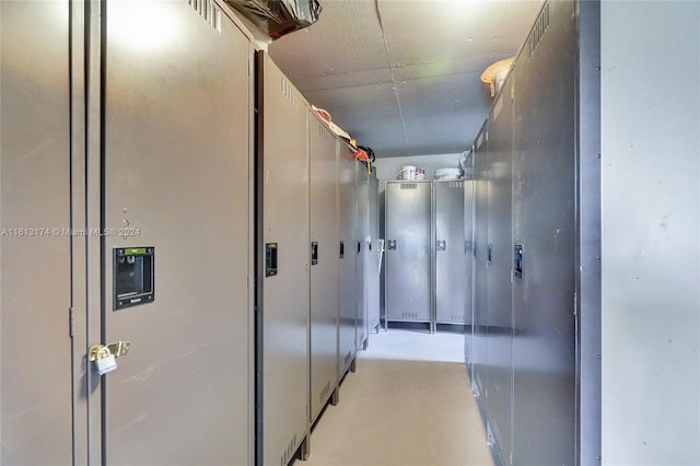 corridor with concrete flooring