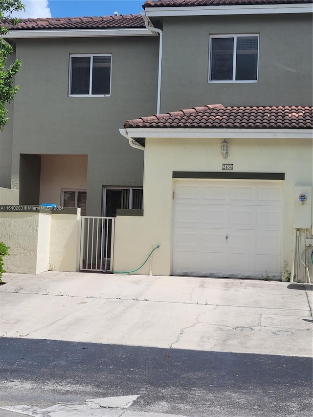 view of front of home with a garage