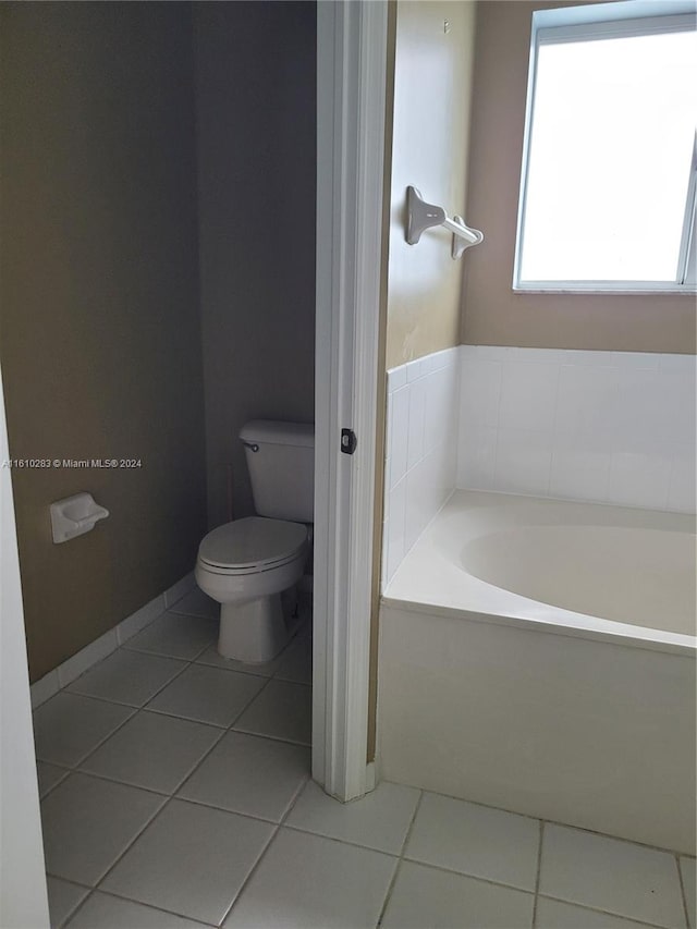 spare room featuring ceiling fan and hardwood / wood-style flooring