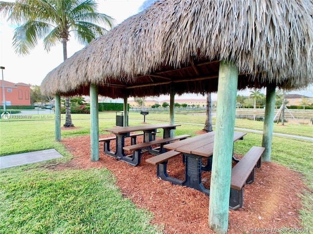 view of home's community featuring a gazebo and a yard