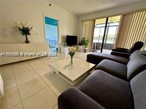 living room featuring light tile patterned floors