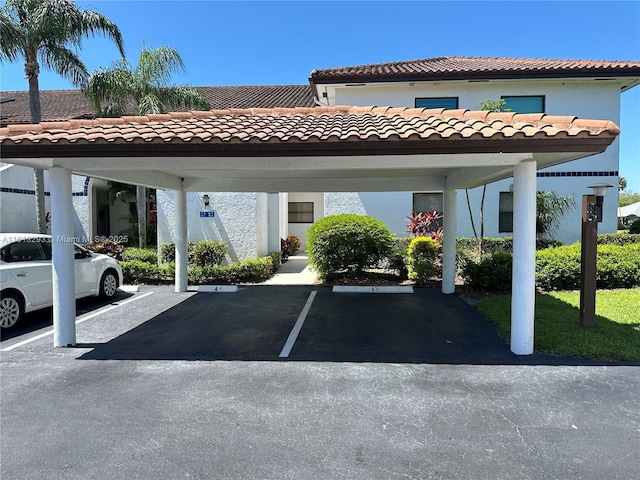 view of parking with a carport