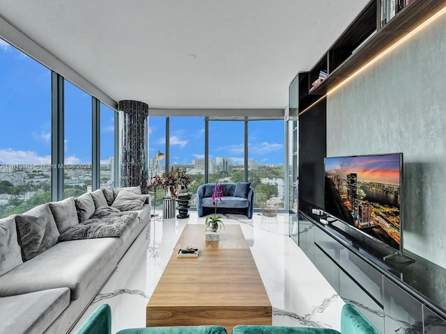 living room featuring floor to ceiling windows