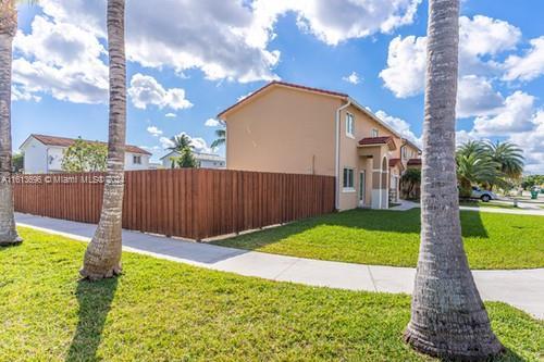 view of property exterior featuring a yard