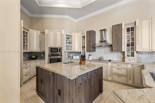 kitchen with wall chimney range hood, stainless steel appliances, crown molding, and tasteful backsplash