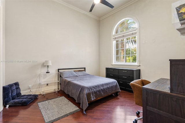 bedroom with crown molding, ceiling fan, and hardwood / wood-style floors