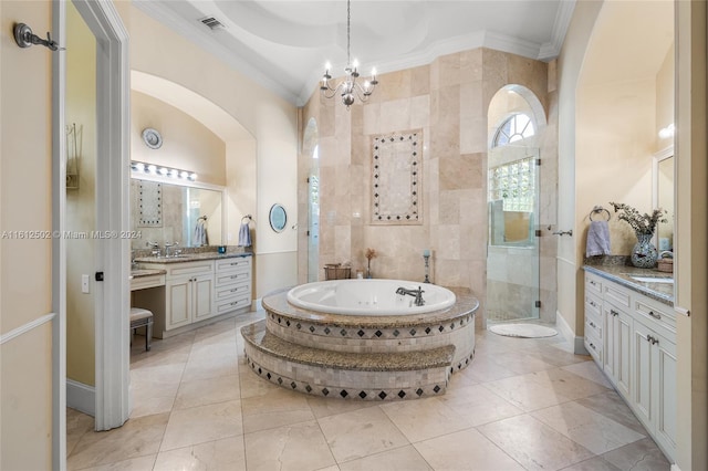 bathroom with tile floors, plus walk in shower, vanity, and a notable chandelier