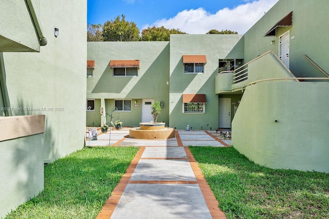11091 NW 7th St Unit 202, Miami, FL 33172 - exterior space featuring stucco siding