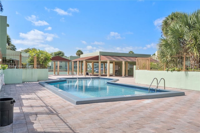 11091 NW 7th St Unit 202, Miami, FL 33172 - pool with a patio, a gazebo, and fence