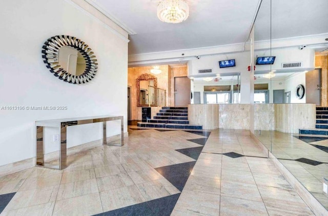 reception area featuring a notable chandelier