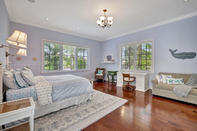 bedroom featuring ornamental molding, dark hardwood / wood-style floors, and a notable chandelier