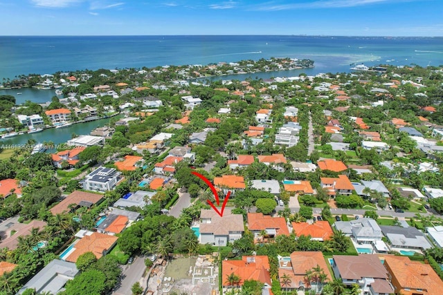 birds eye view of property featuring a water view