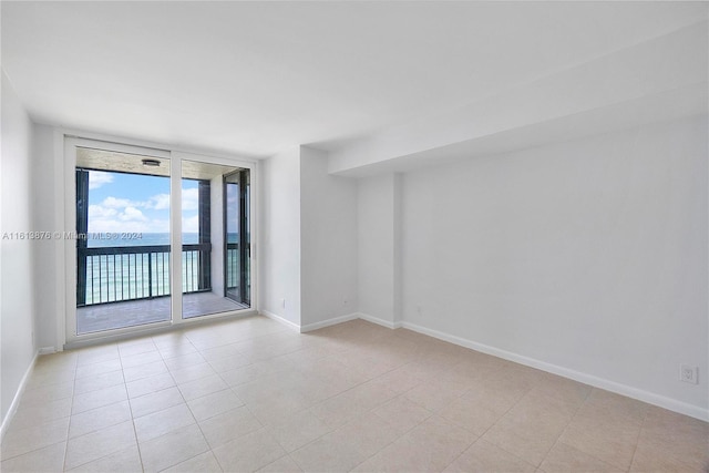 view of tiled spare room